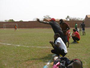 Local Youth Football Coaches Coaching Their U13 Team