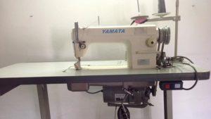 Donated sewing machine for the production of fairtrade fashion from recycled material in Luanda, Angola
